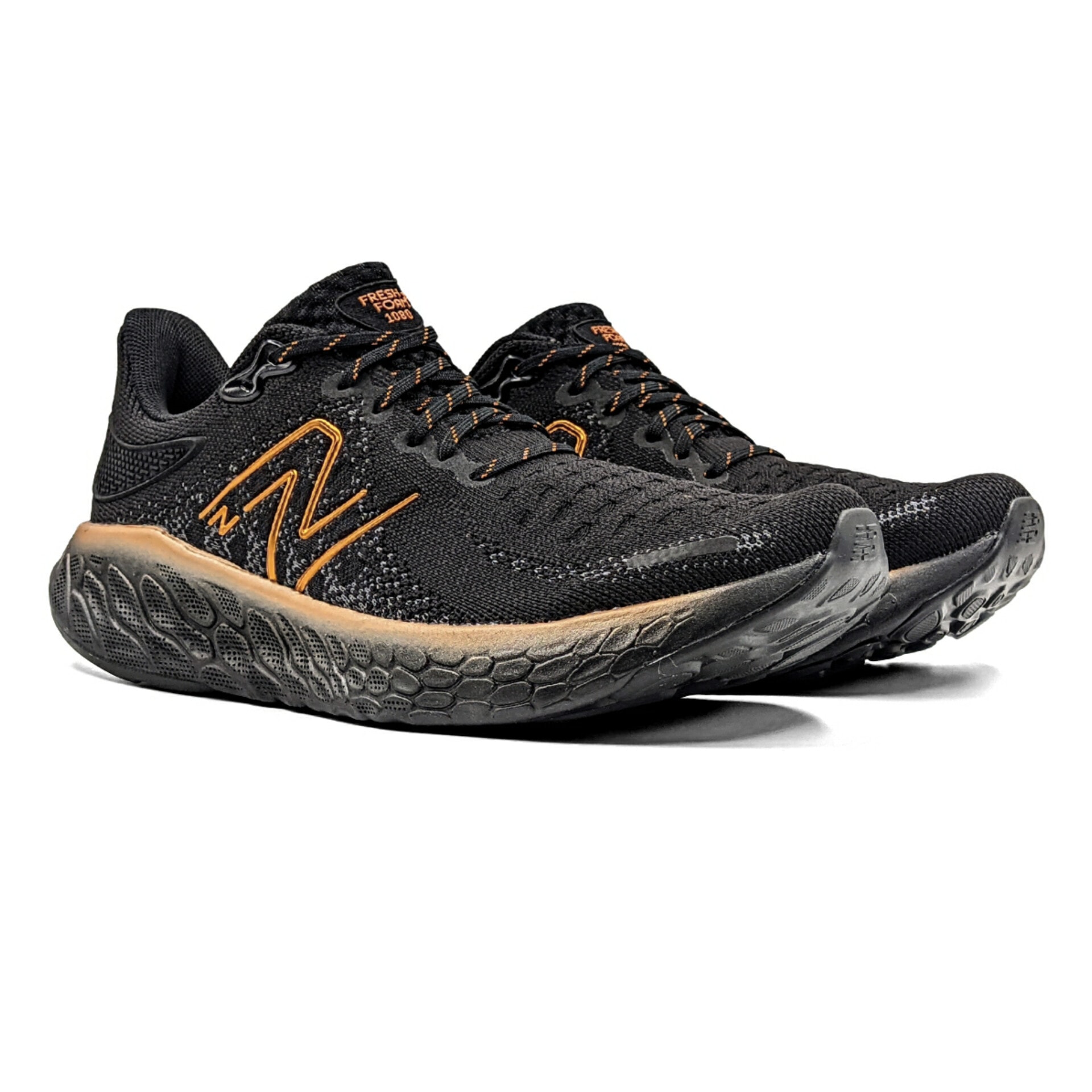 New balance outlet cinza e dourado