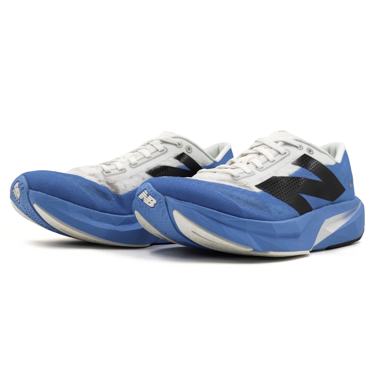 Tênis New Balance FuelCell Rebel V4 Masculino - Azul/Branco