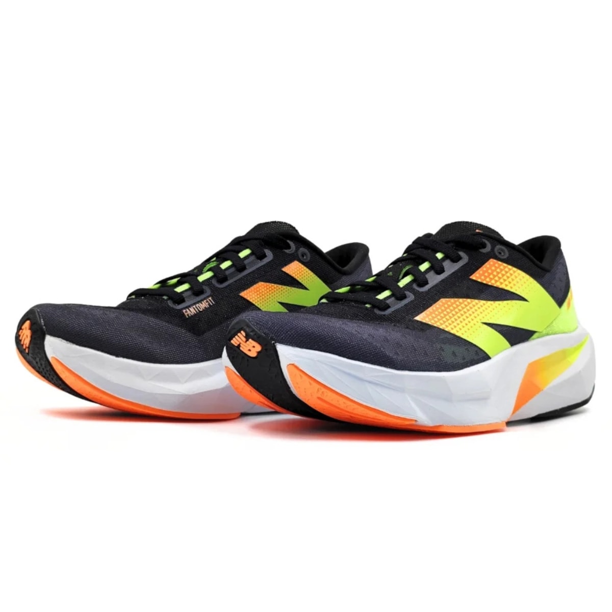 Tênis New Balance FuelCell Rebel V4 Masculino - Preto/Verde