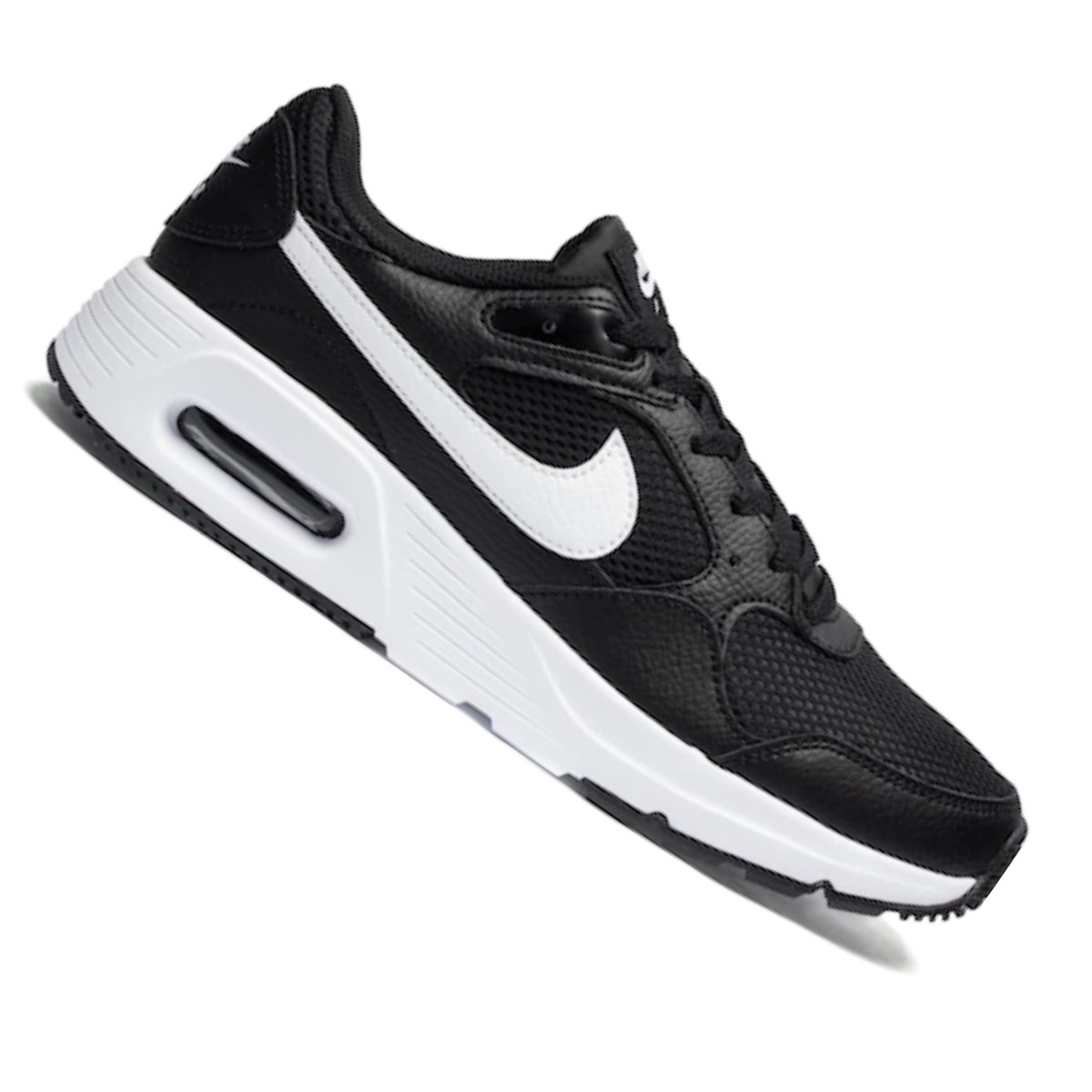 Tenis preto best sale com branco nike